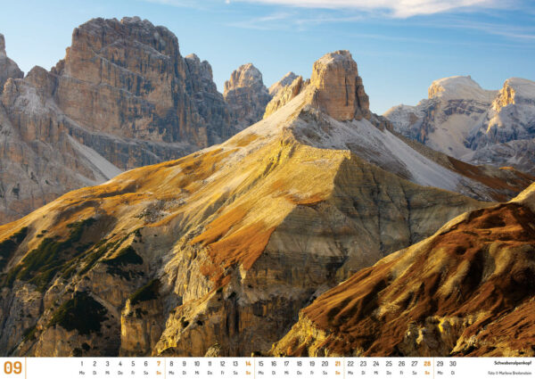 2025 Dolomiten Calendar, September. Photograph of Schwabenalpenkopf, a large mountain with treeless, yellow slopes.